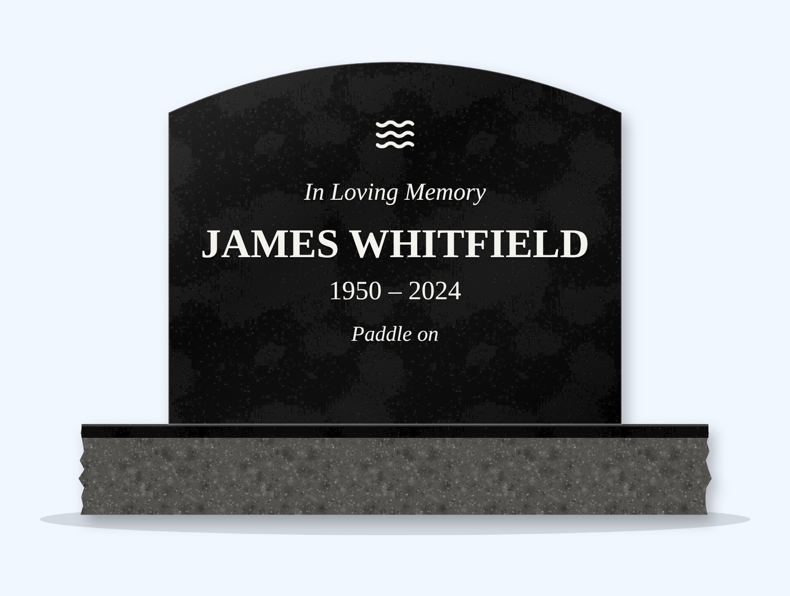 Absolute Black curved top headstone on a granite base, engraved for James Whitfield