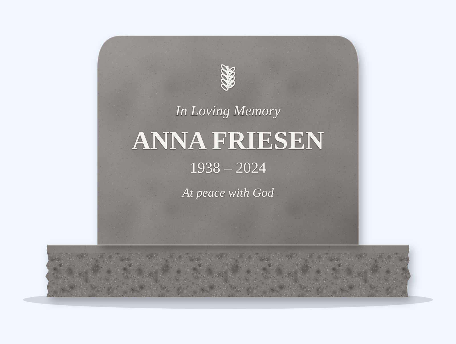 Indian Grey rounded top headstone on a granite base, engraved for Anna Friesen