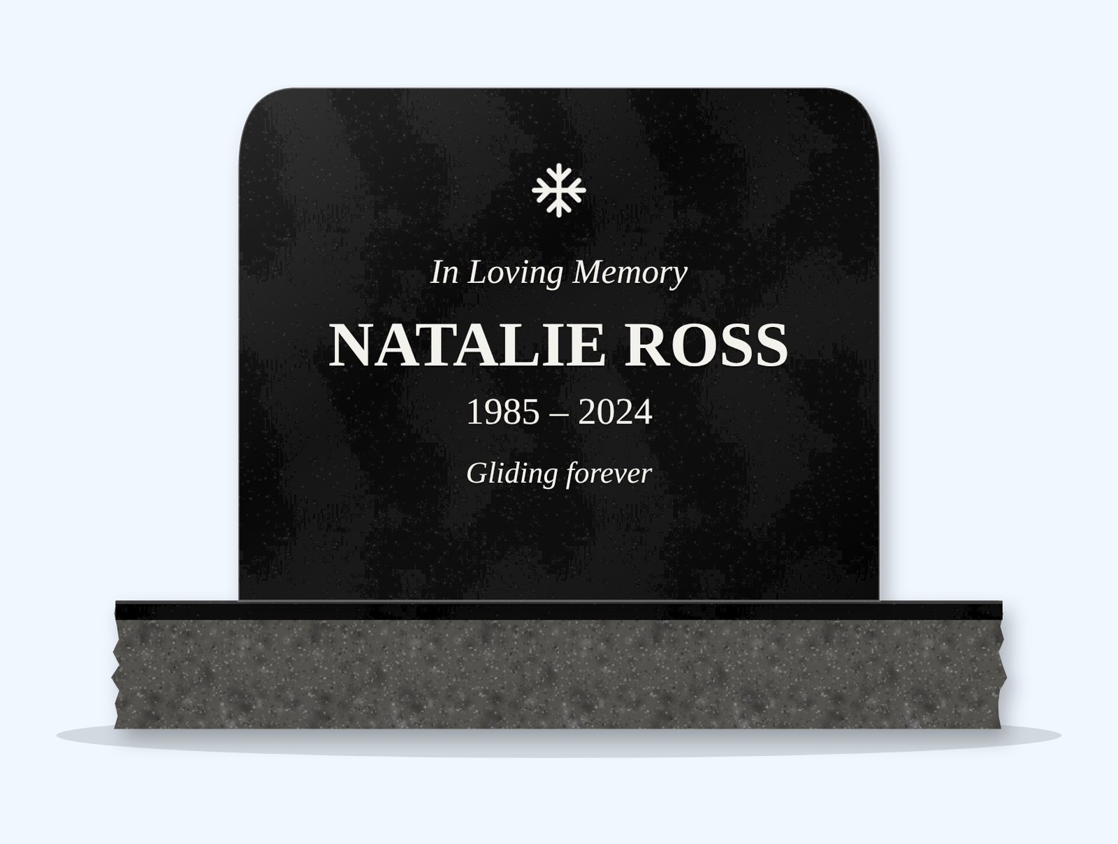 Absolute Black rounded top headstone on a granite base, engraved for Natalie Ross
