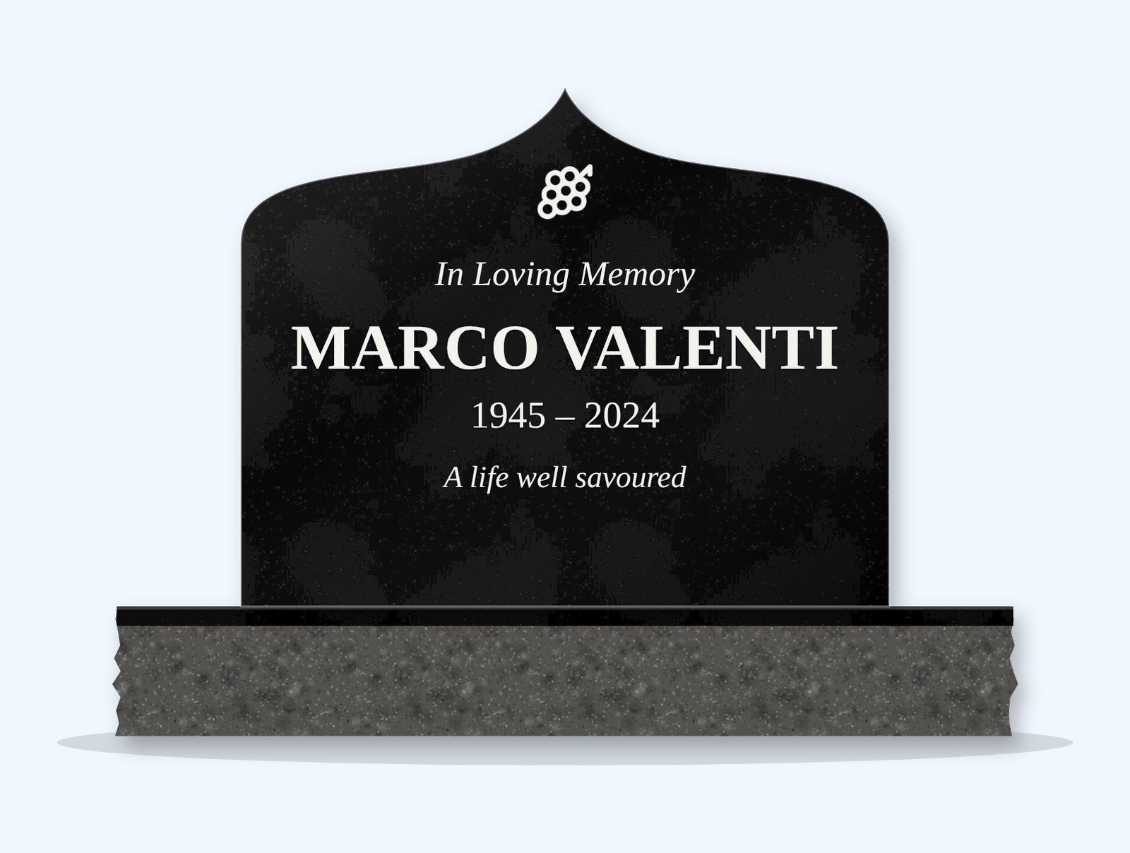 Absolute Black ogee arch headstone on a granite base, engraved for Marco Valenti