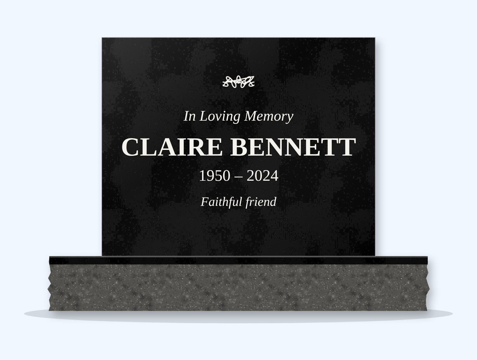Absolute Black rectangle headstone on a granite base, engraved for Claire Bennett
