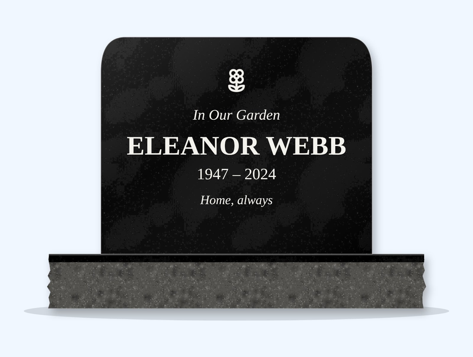 Absolute Black rounded top headstone on a granite base, engraved for Eleanor Webb