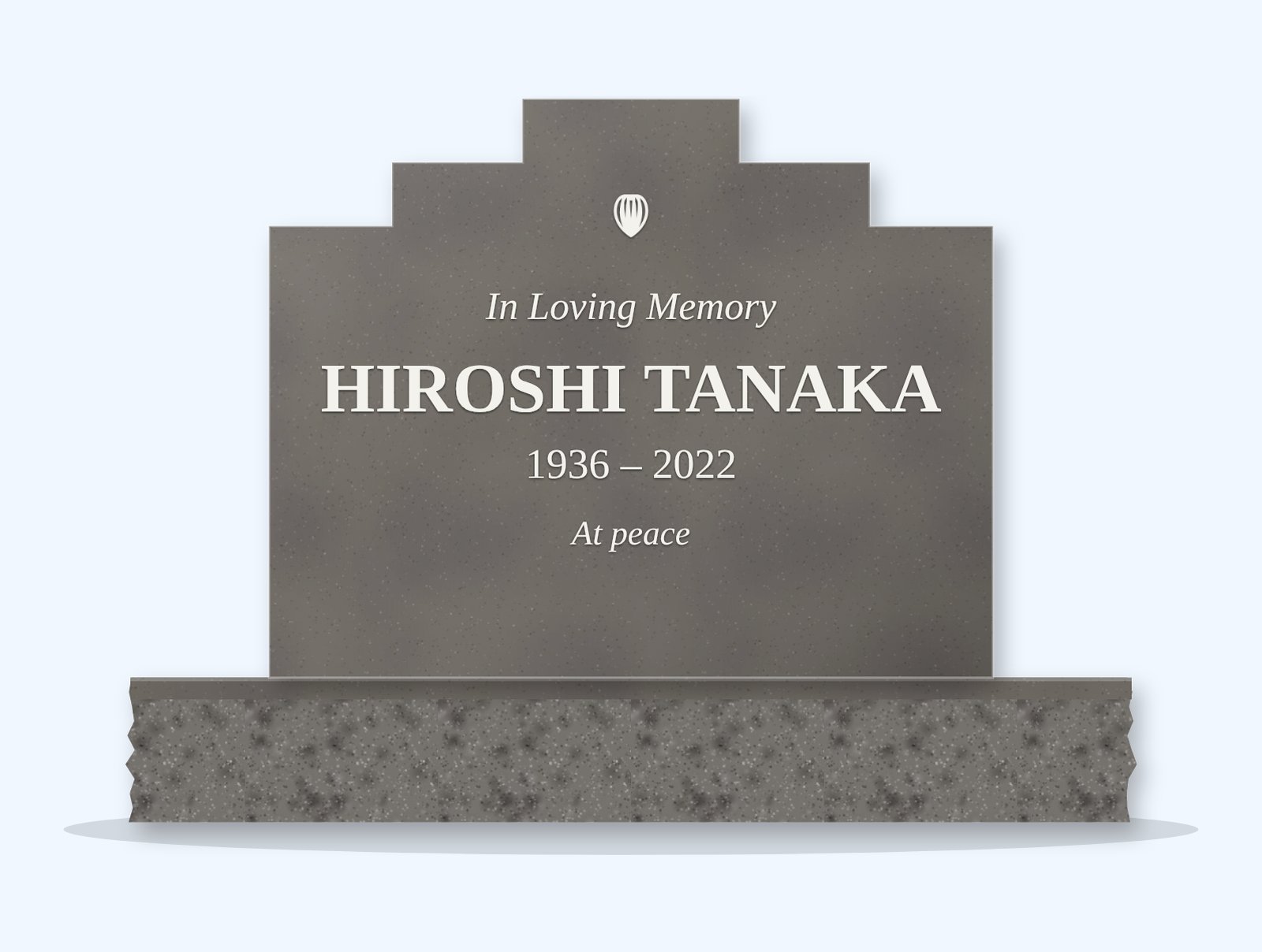 Steel Grey stepped tablet headstone on a granite base, engraved for Hiroshi Tanaka