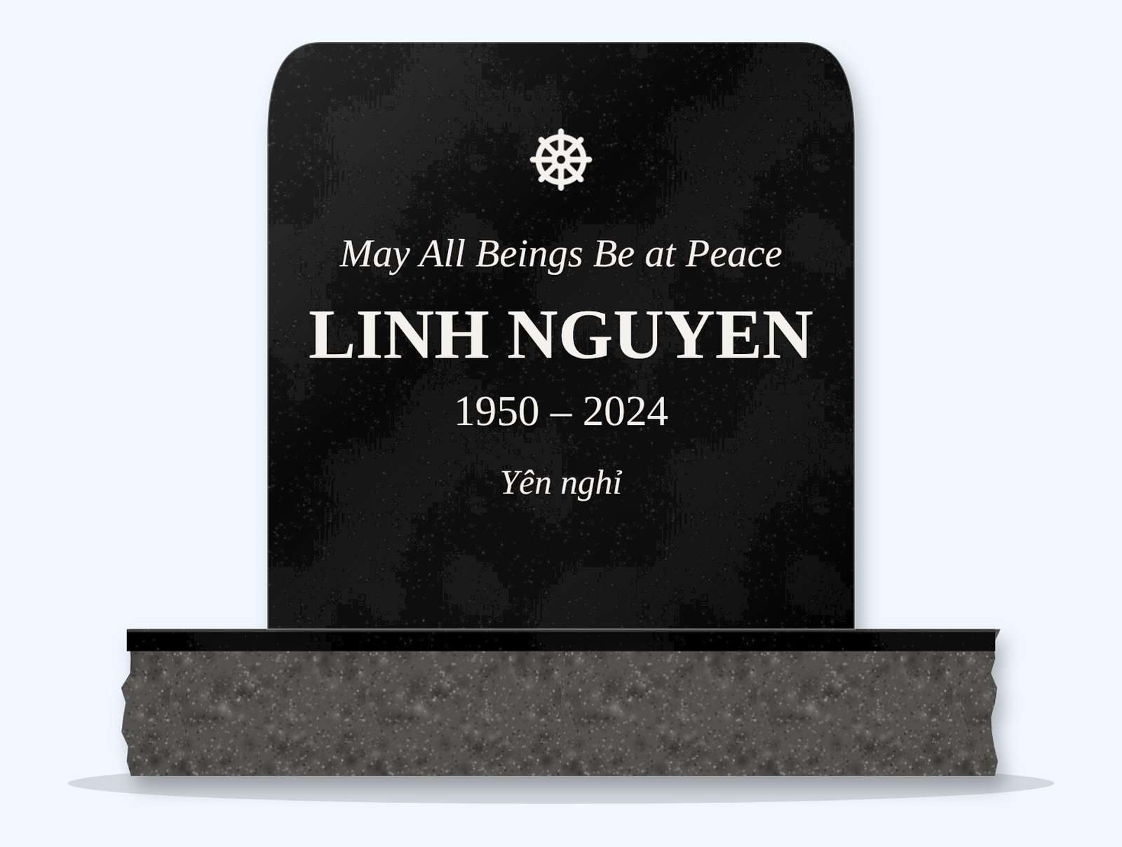 Absolute Black rounded top headstone on a granite base, engraved for Linh Nguyen