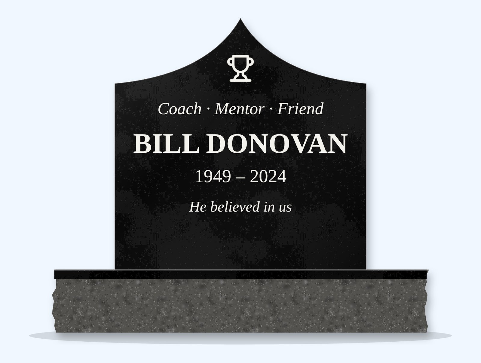 Absolute Black curved gable headstone on a granite base, engraved for Bill Donovan