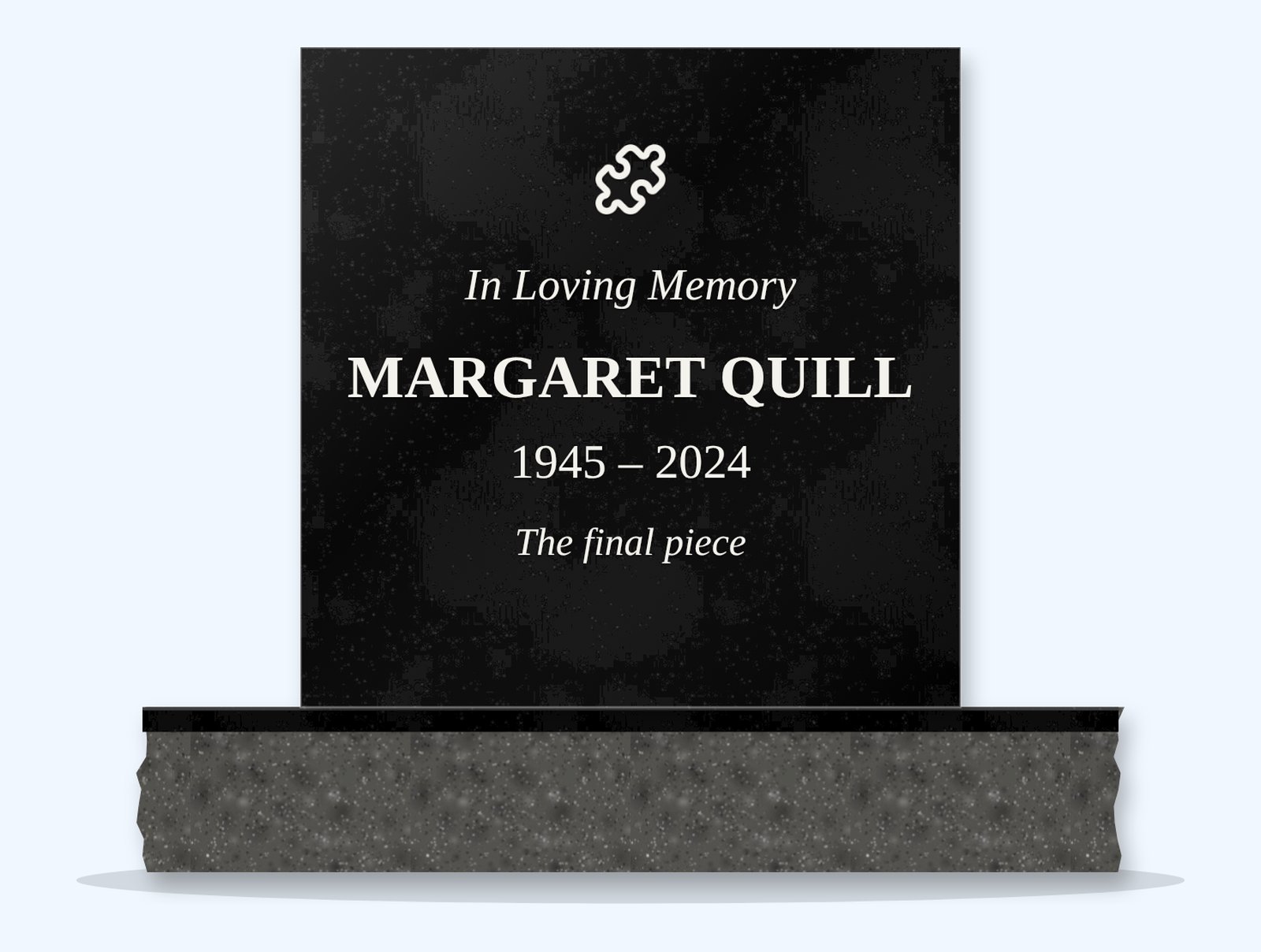 Absolute Black rectangle headstone on a granite base, engraved for Margaret Quill
