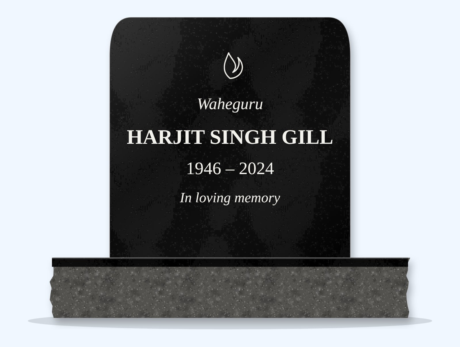 Absolute Black rounded top headstone on a granite base, engraved for Harjit Singh Gill