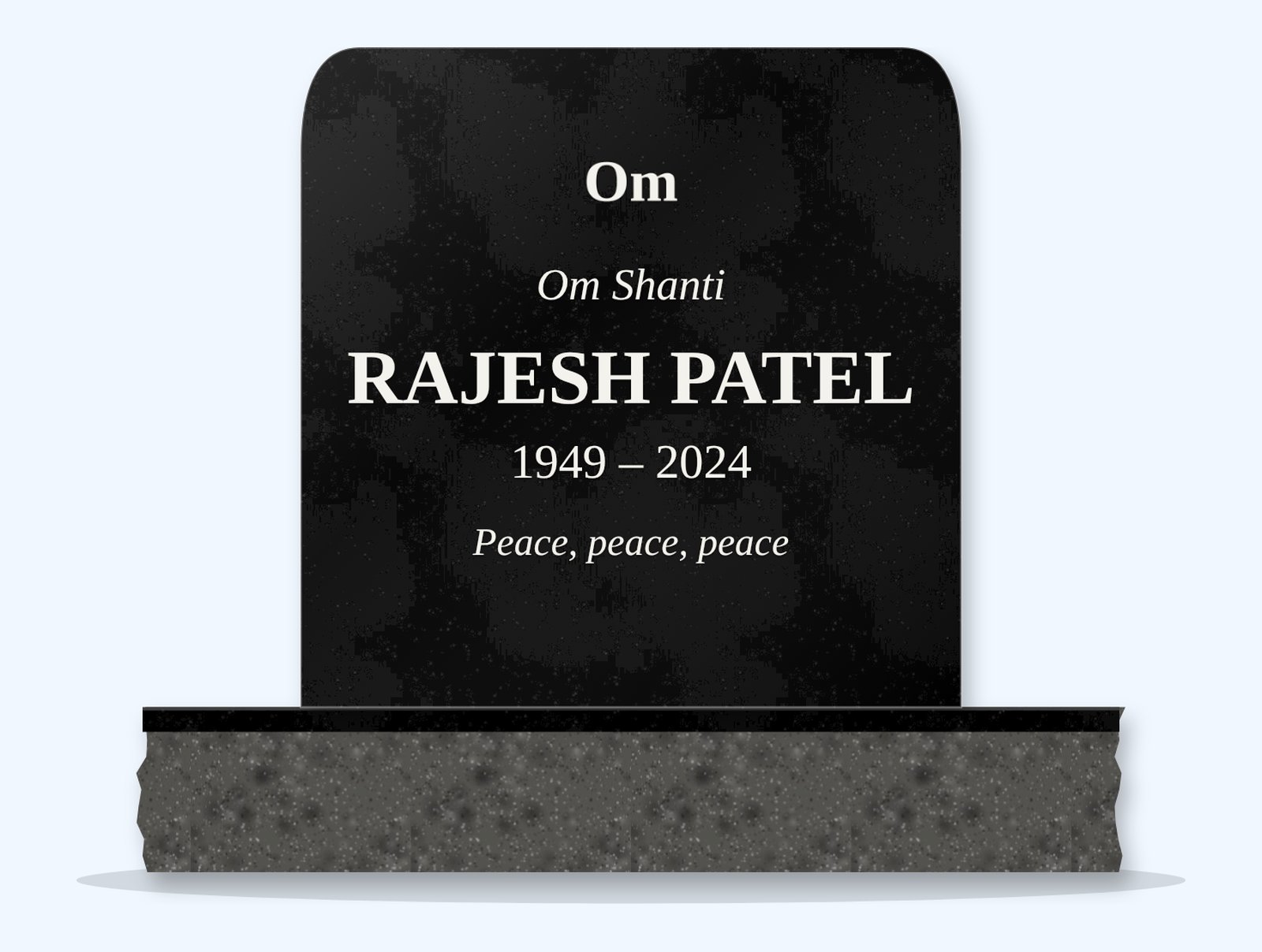 Absolute Black rounded top headstone on a granite base, engraved for Rajesh Patel