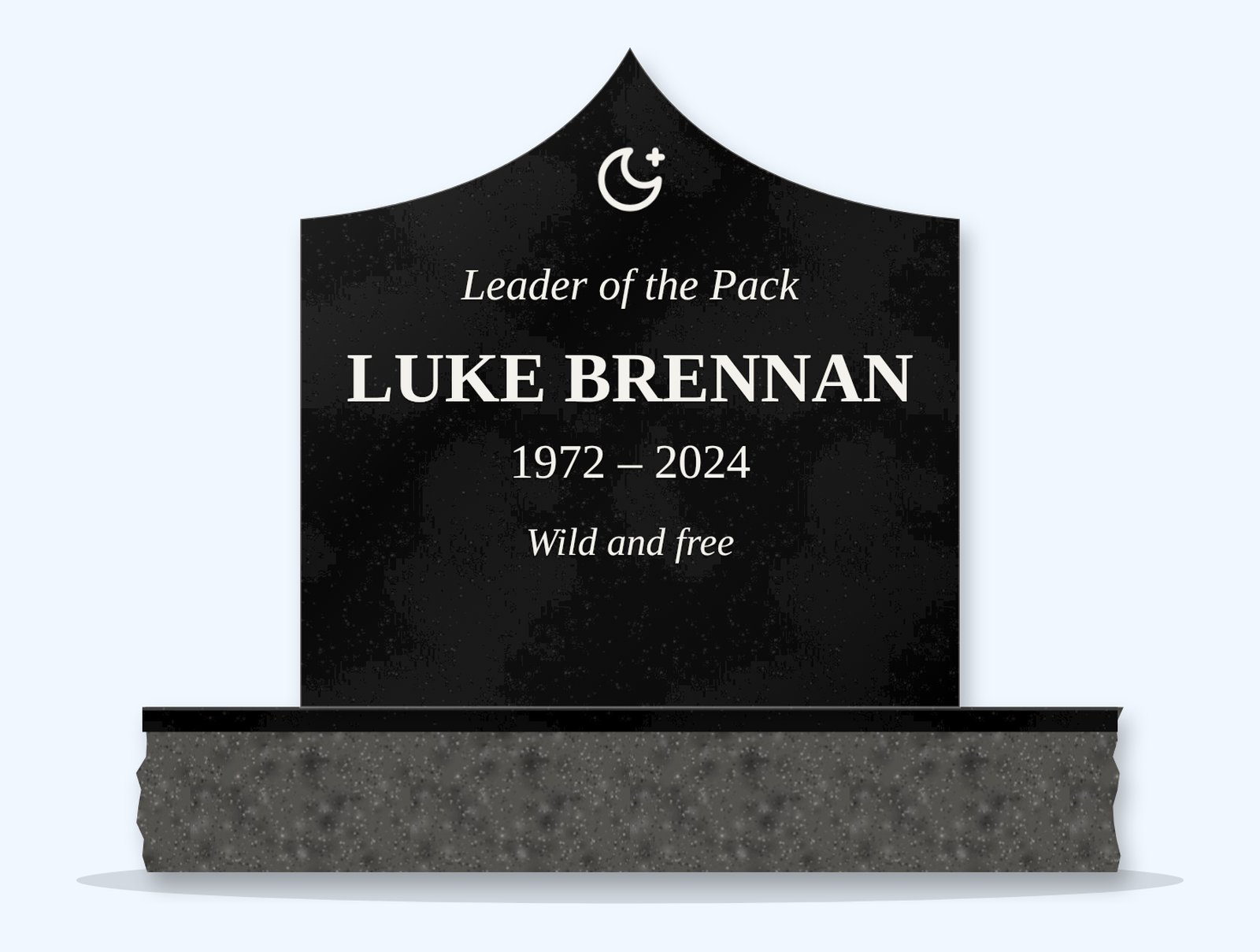 Absolute Black curved gable headstone on a granite base, engraved for Luke Brennan