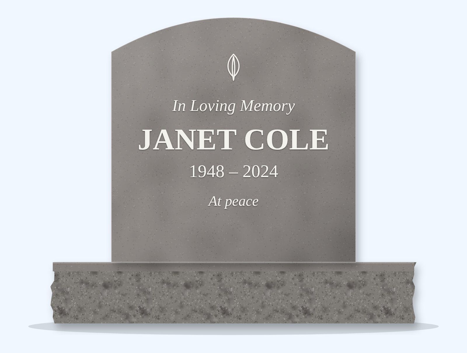 Indian Grey curved top headstone on a granite base, engraved for Janet Cole