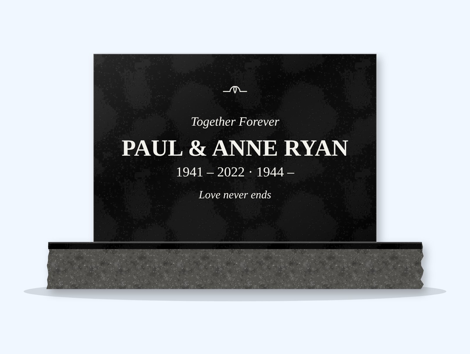 Absolute Black rectangle headstone on a granite base, engraved for Paul and Anne Ryan