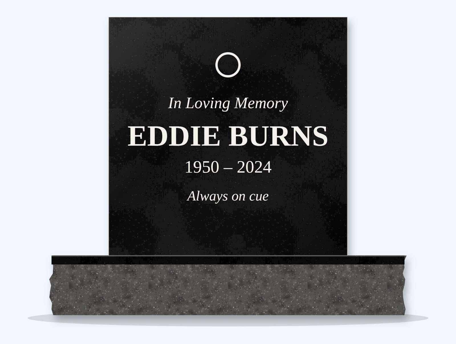 Absolute Black rectangle headstone on a granite base, engraved for Eddie Burns