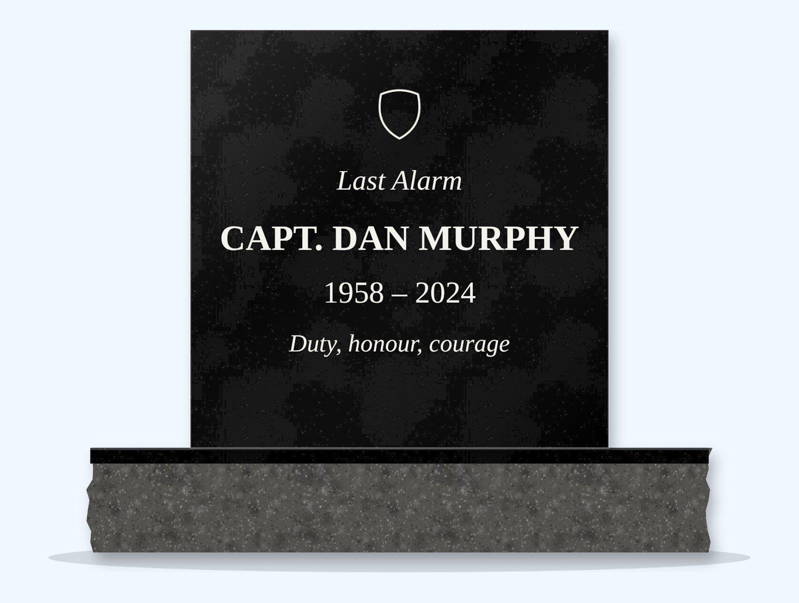 Absolute Black rectangle headstone on a granite base, engraved for Capt. Dan Murphy