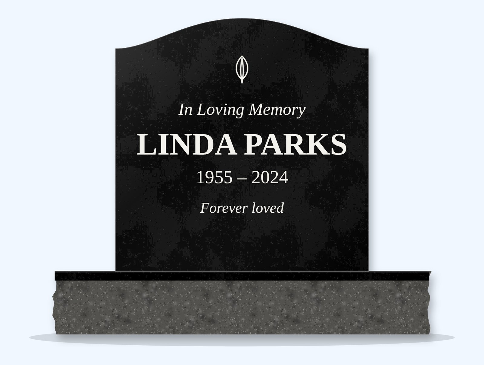 Absolute Black serpentine headstone on a granite base, engraved for Linda Parks