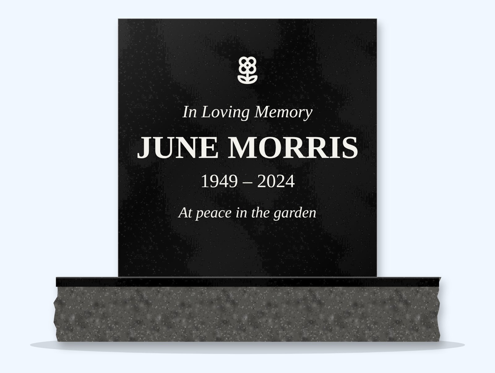 Absolute Black rectangle headstone on a granite base, engraved for June Morris