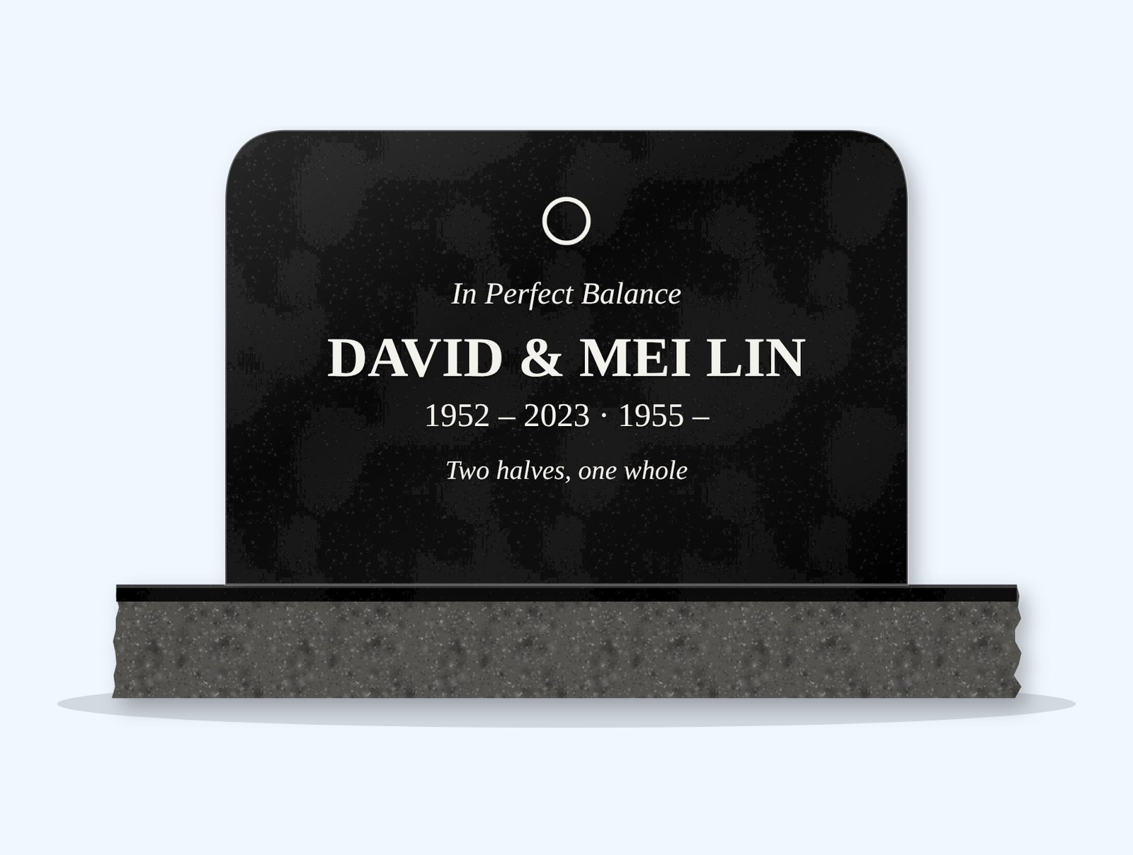 Absolute Black rounded top headstone on a granite base, engraved for David and Mei Lin