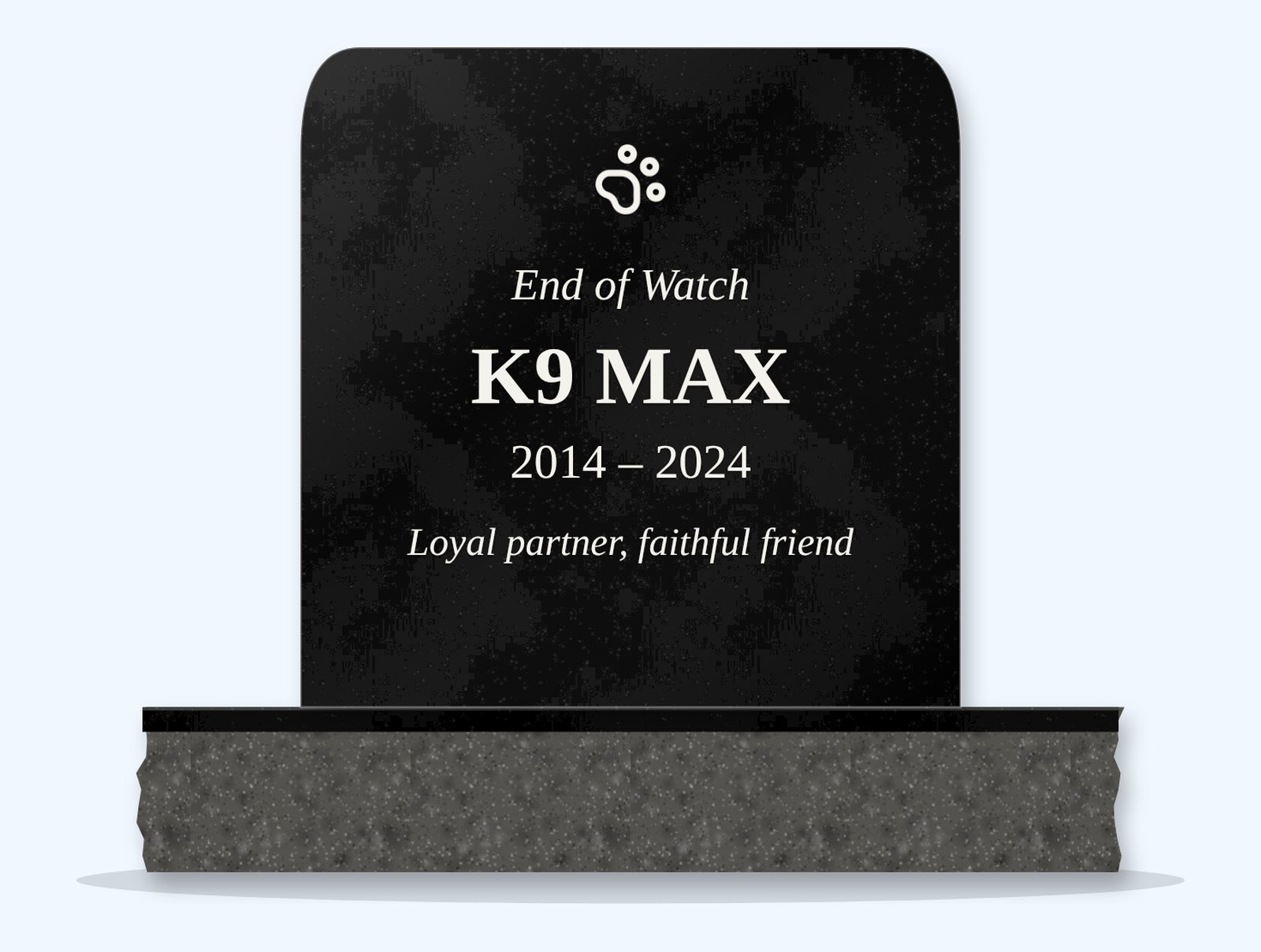 Absolute Black rounded top memorial stone on a granite base, engraved for K9 Max