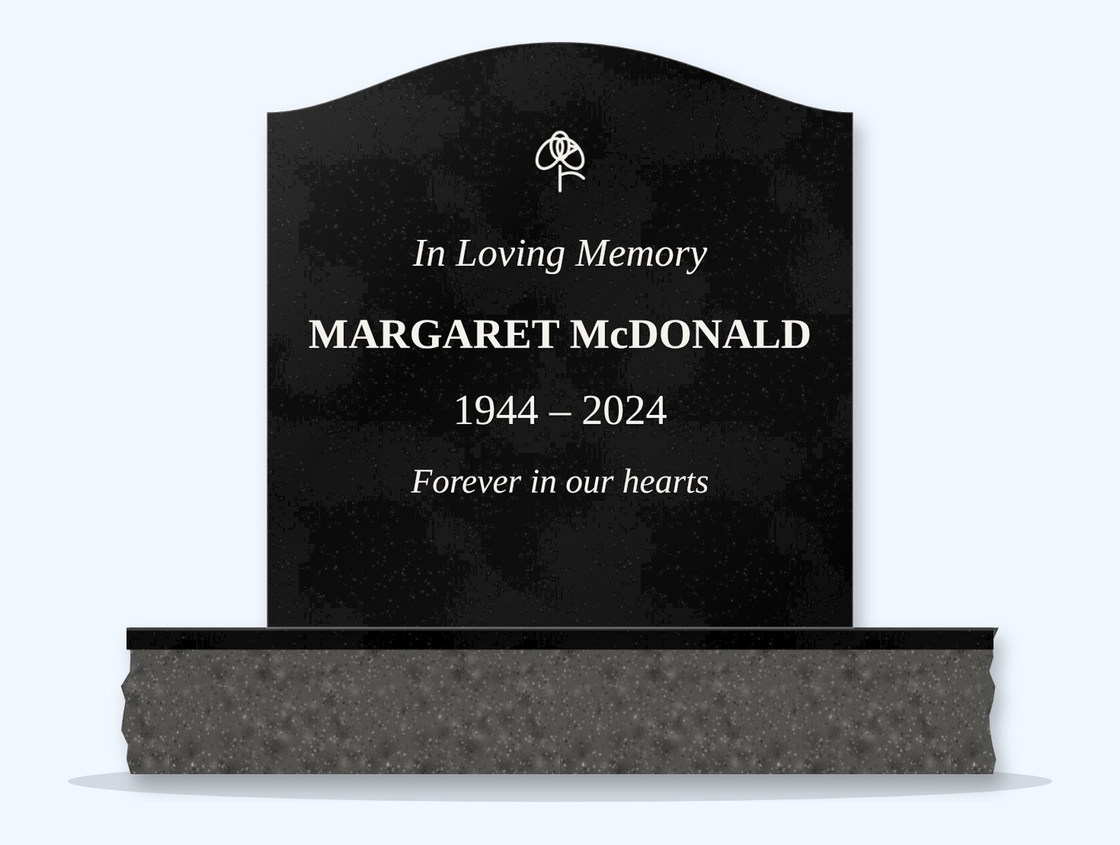 Absolute Black serpentine headstone on a granite base, engraved for Margaret McDonald