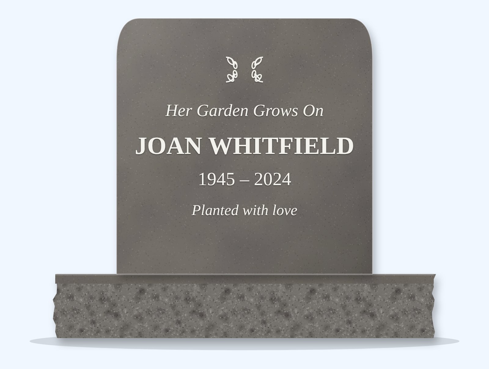 Steel Grey rounded headstone on a granite base, engraved for Joan Whitfield