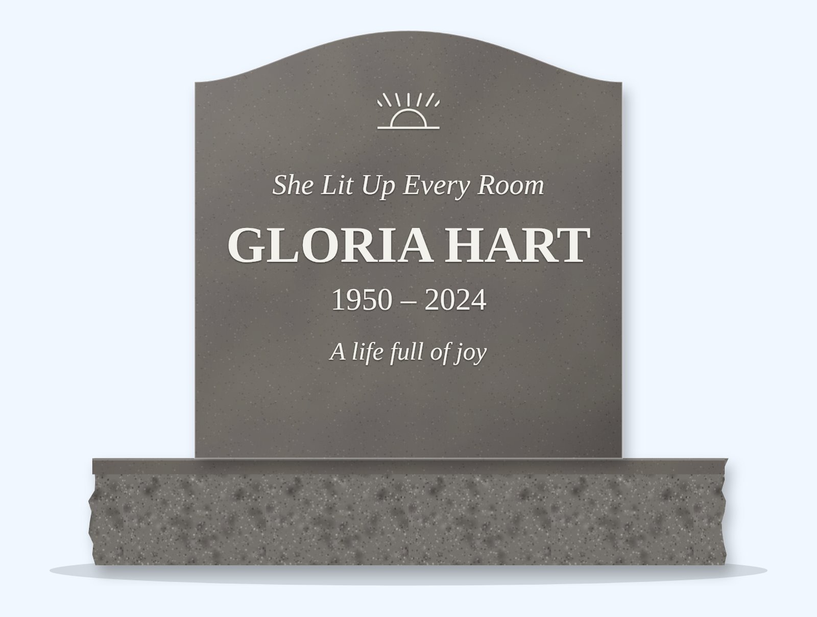 Steel Grey serpentine headstone on a granite base, engraved for Gloria Hart
