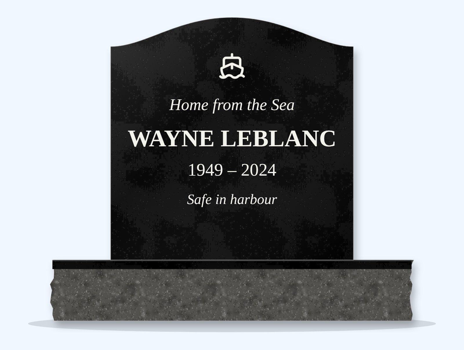 Absolute Black serpentine headstone on a granite base, engraved for Wayne Leblanc