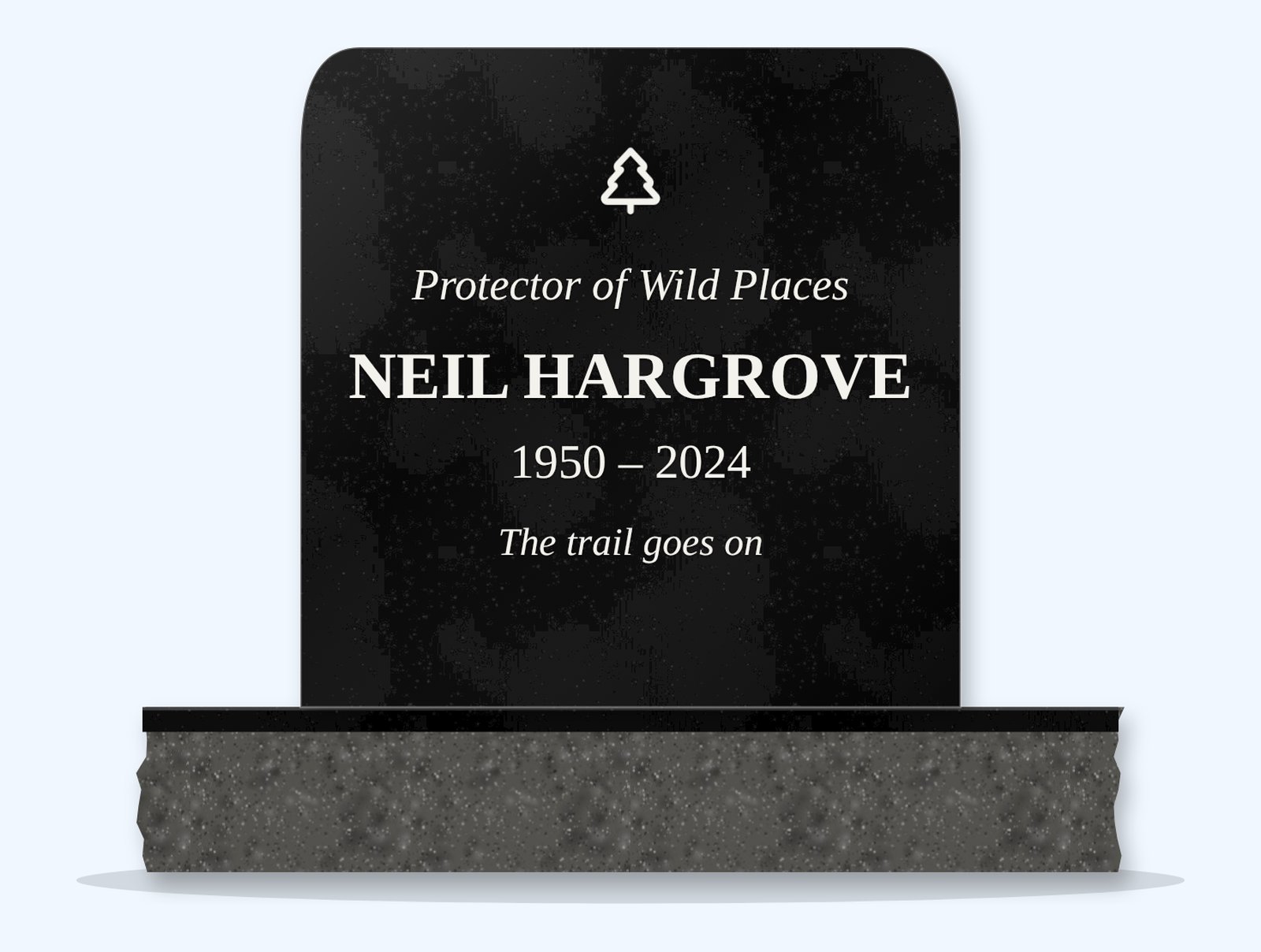 Absolute Black rounded headstone on a granite base, engraved for Neil Hargrove