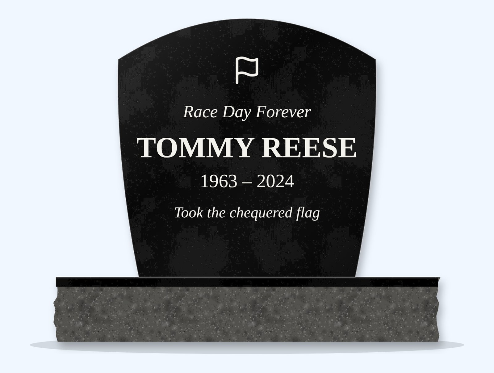 Absolute Black swoop headstone on a granite base, engraved for Tommy Reese
