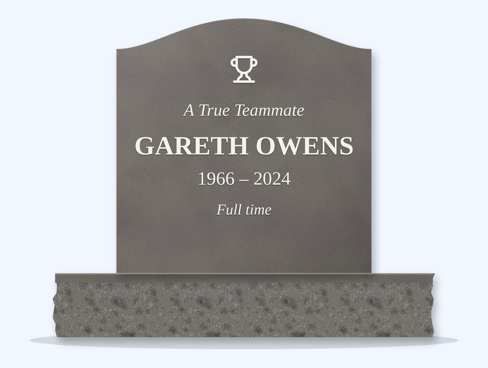 Steel Grey serpentine headstone on a granite base, engraved for Gareth Owens