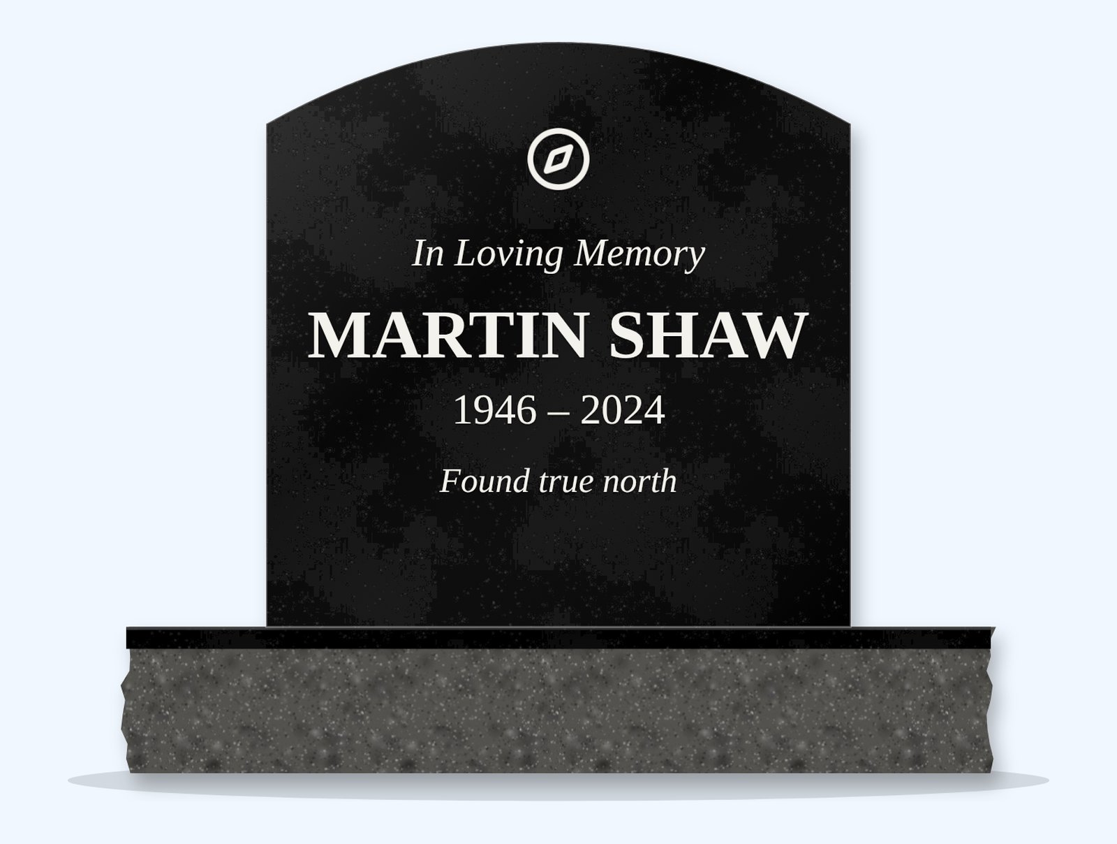 Absolute Black curved-top headstone on a granite base, engraved for Martin Shaw