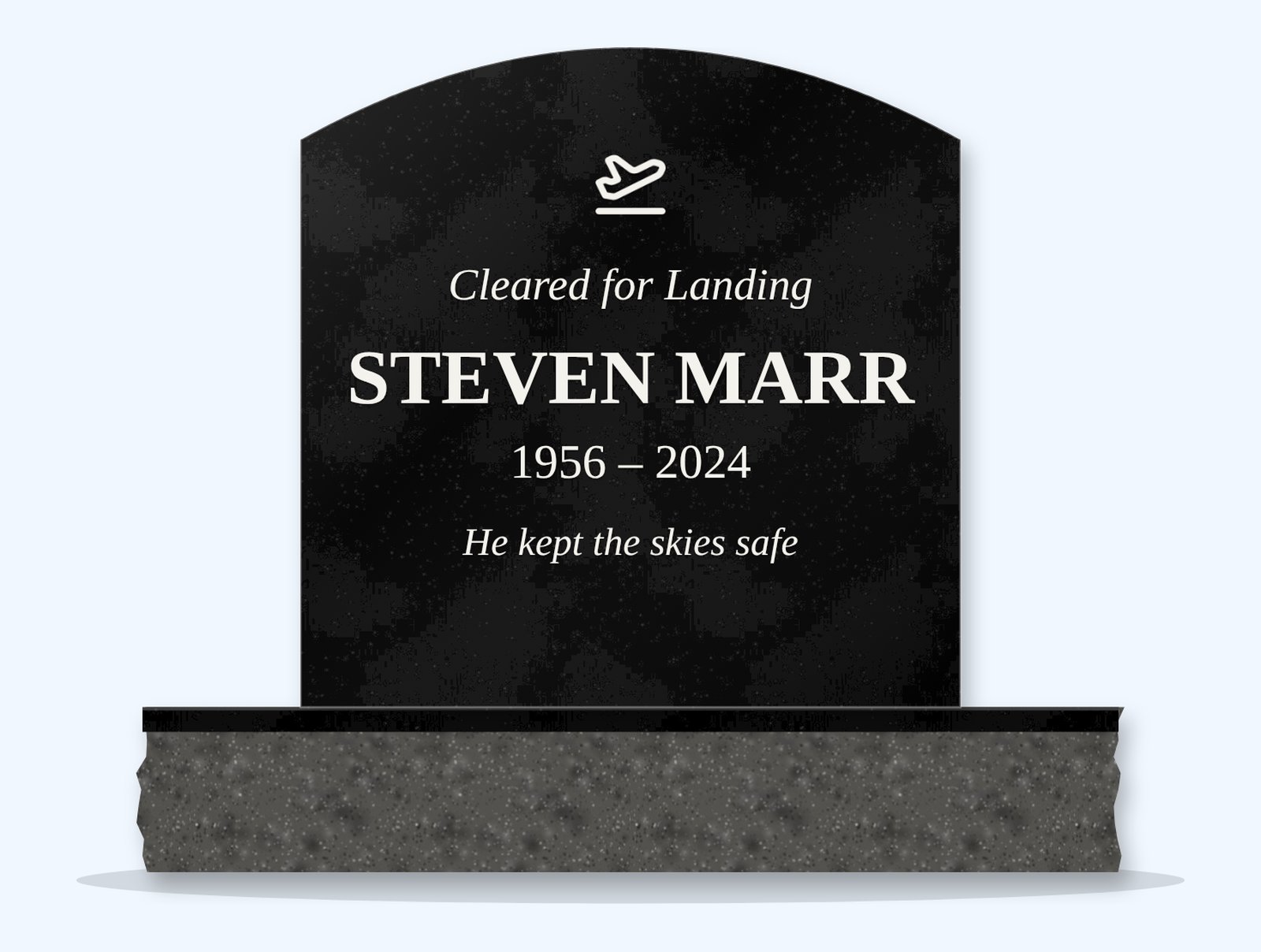 Absolute Black curved-top headstone on a granite base, engraved for Steven Marr