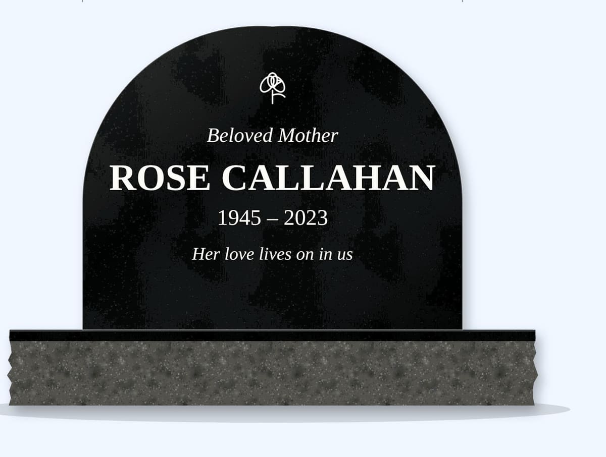 Absolute Black teardrop arch headstone on a granite base, engraved for Rose Callahan
