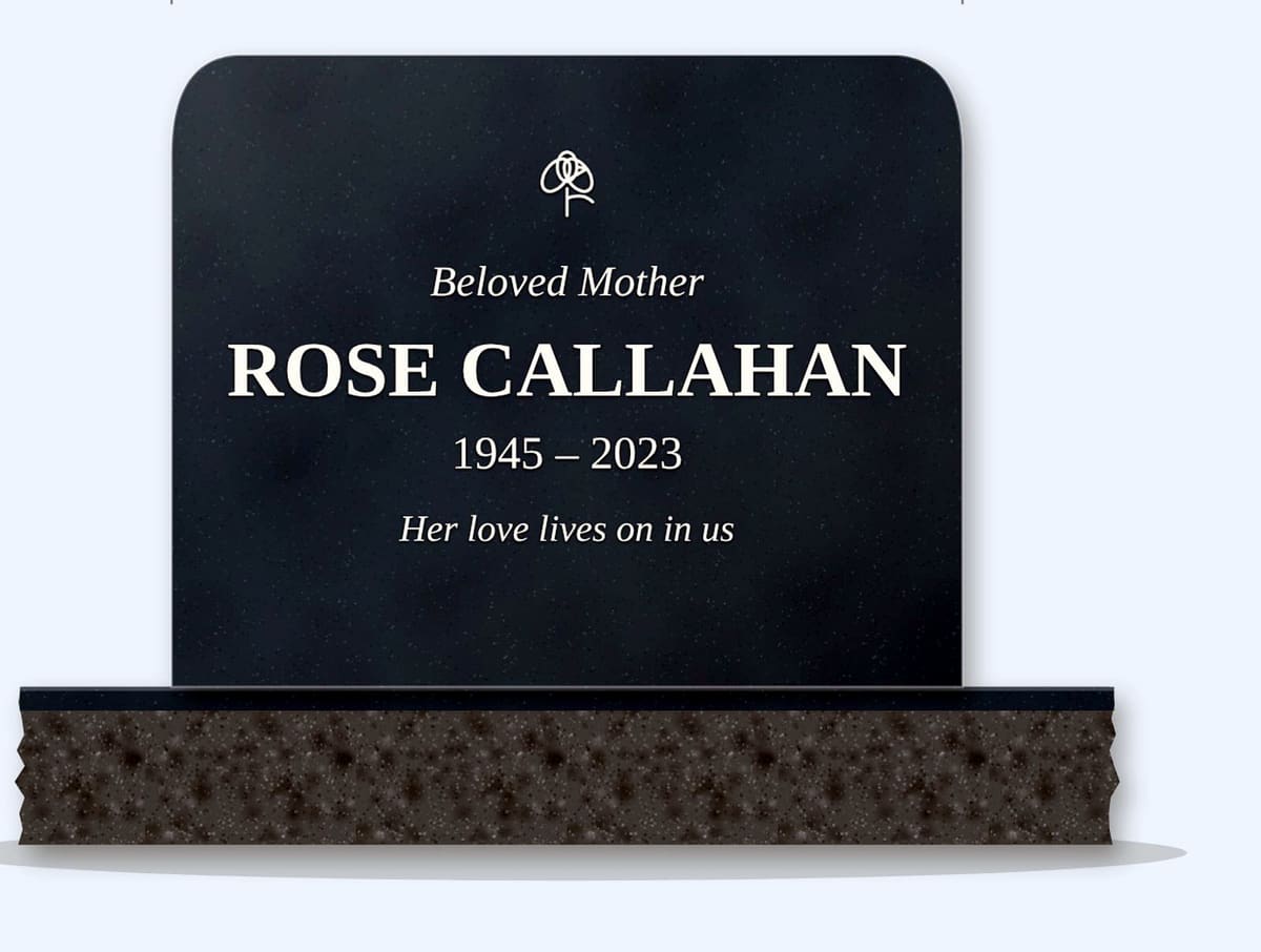 Bahamas Blue rounded top headstone on a granite base, engraved for Rose Callahan