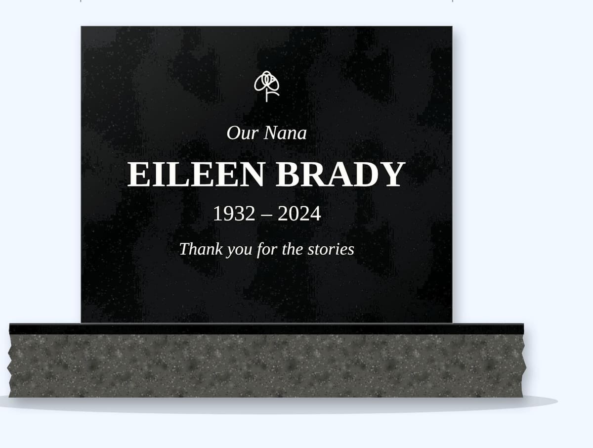 Absolute Black square headstone on a granite base, engraved for Eileen Brady
