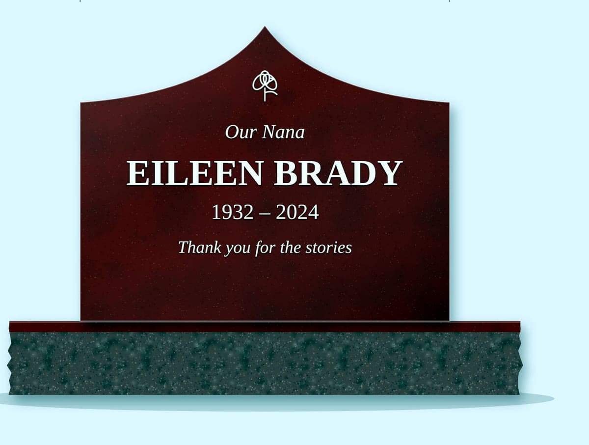 Indian Red gable headstone on a granite base, engraved for Eileen Brady