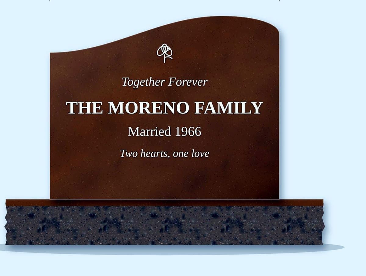 Tan Brown right wave headstone on a granite base, engraved for the Moreno Family
