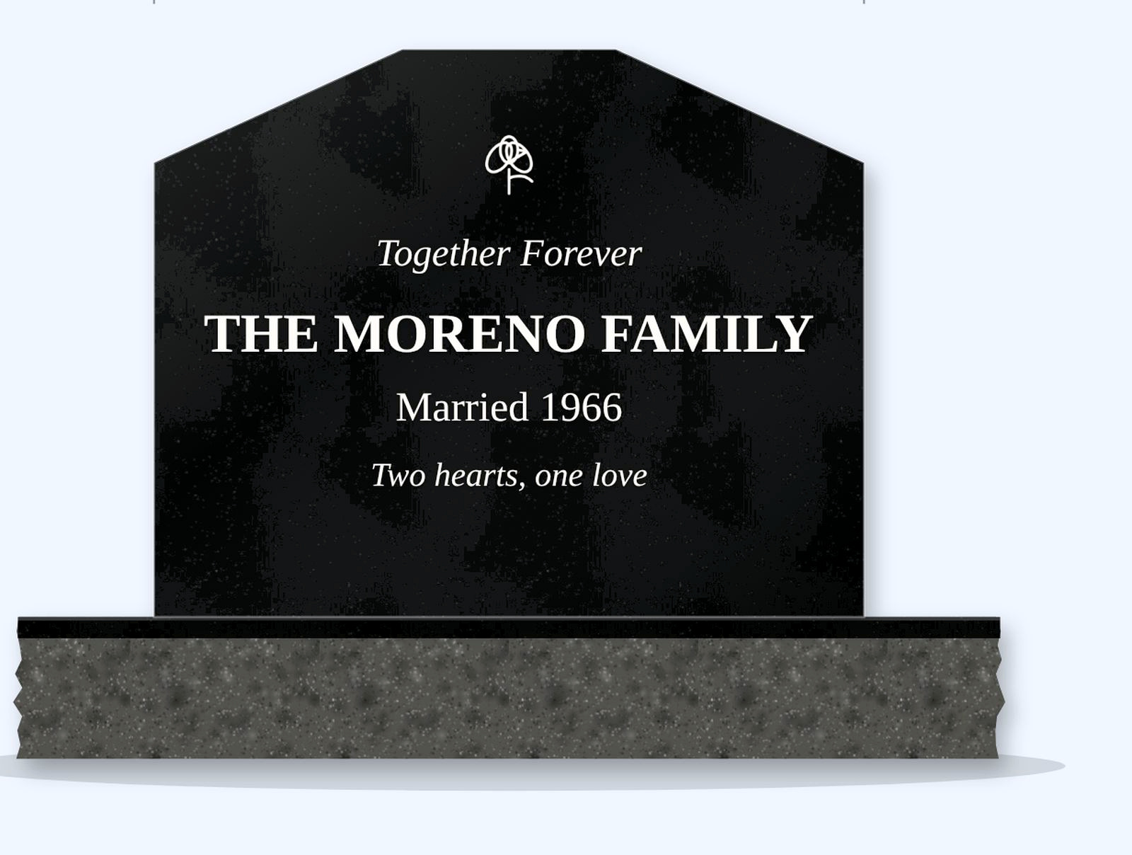Absolute Black cropped peak headstone on a granite base, engraved for the Moreno Family