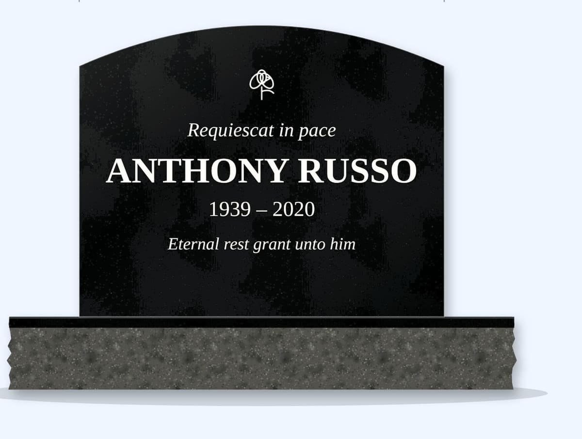 Absolute Black curved top headstone on a granite base, engraved for Anthony Russo