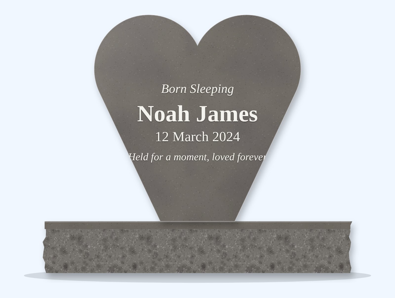 Steel Grey heart-shaped headstone on a granite base, engraved for Noah James