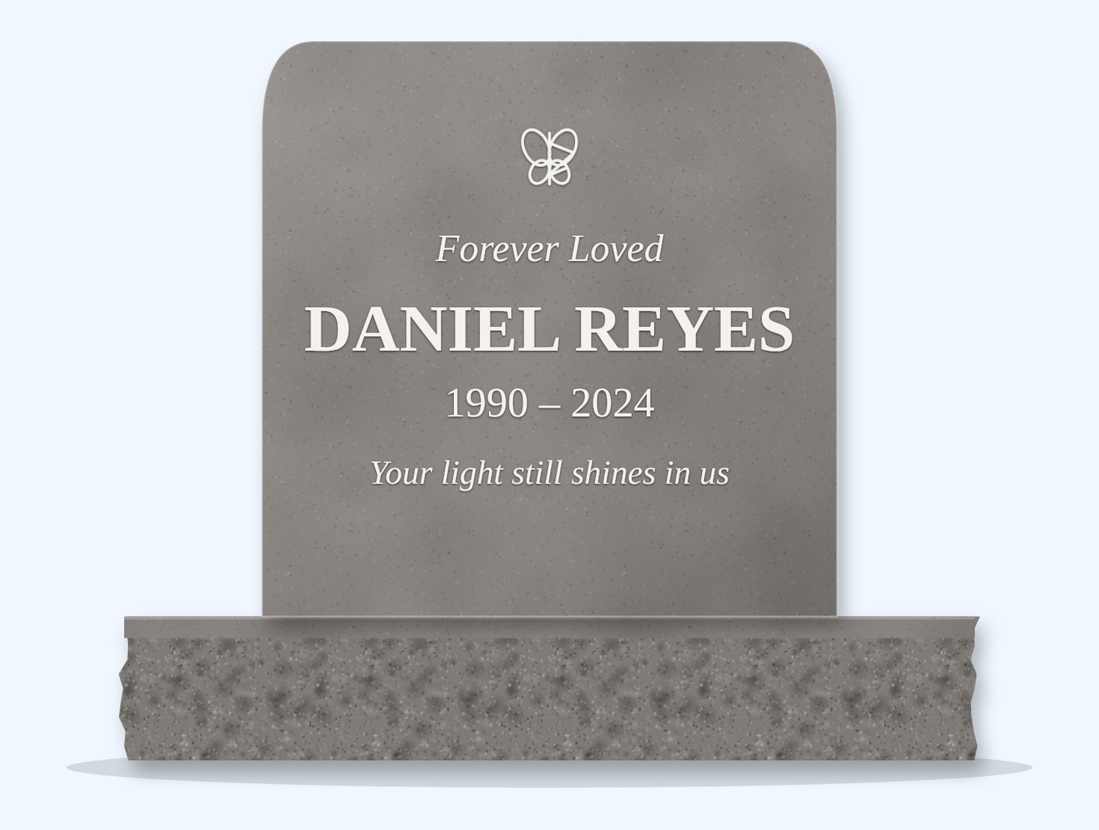 Indian Grey rounded headstone on a granite base, engraved for Daniel Reyes