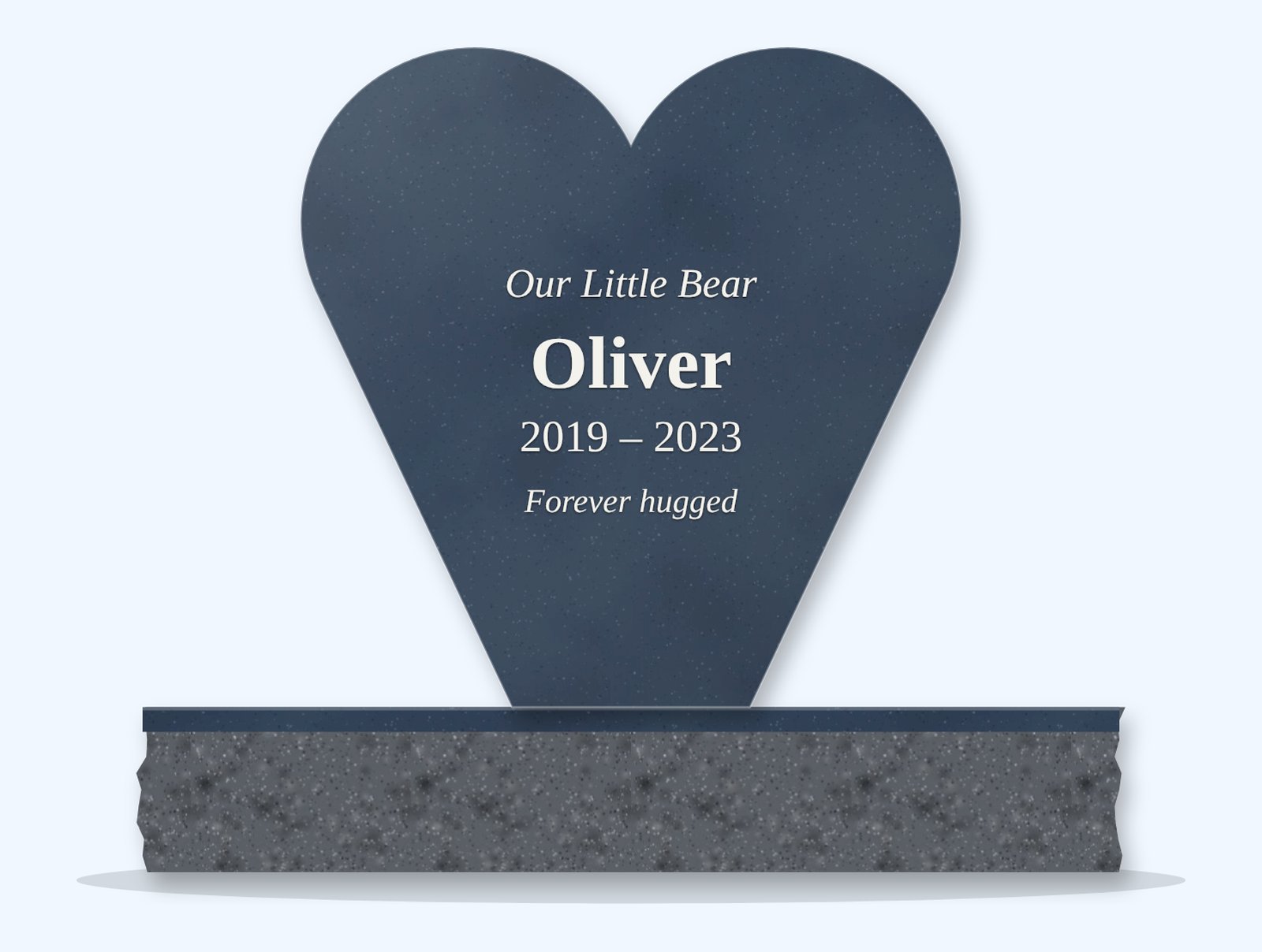 Blue Pearl heart-shaped headstone on a granite base, engraved for Oliver