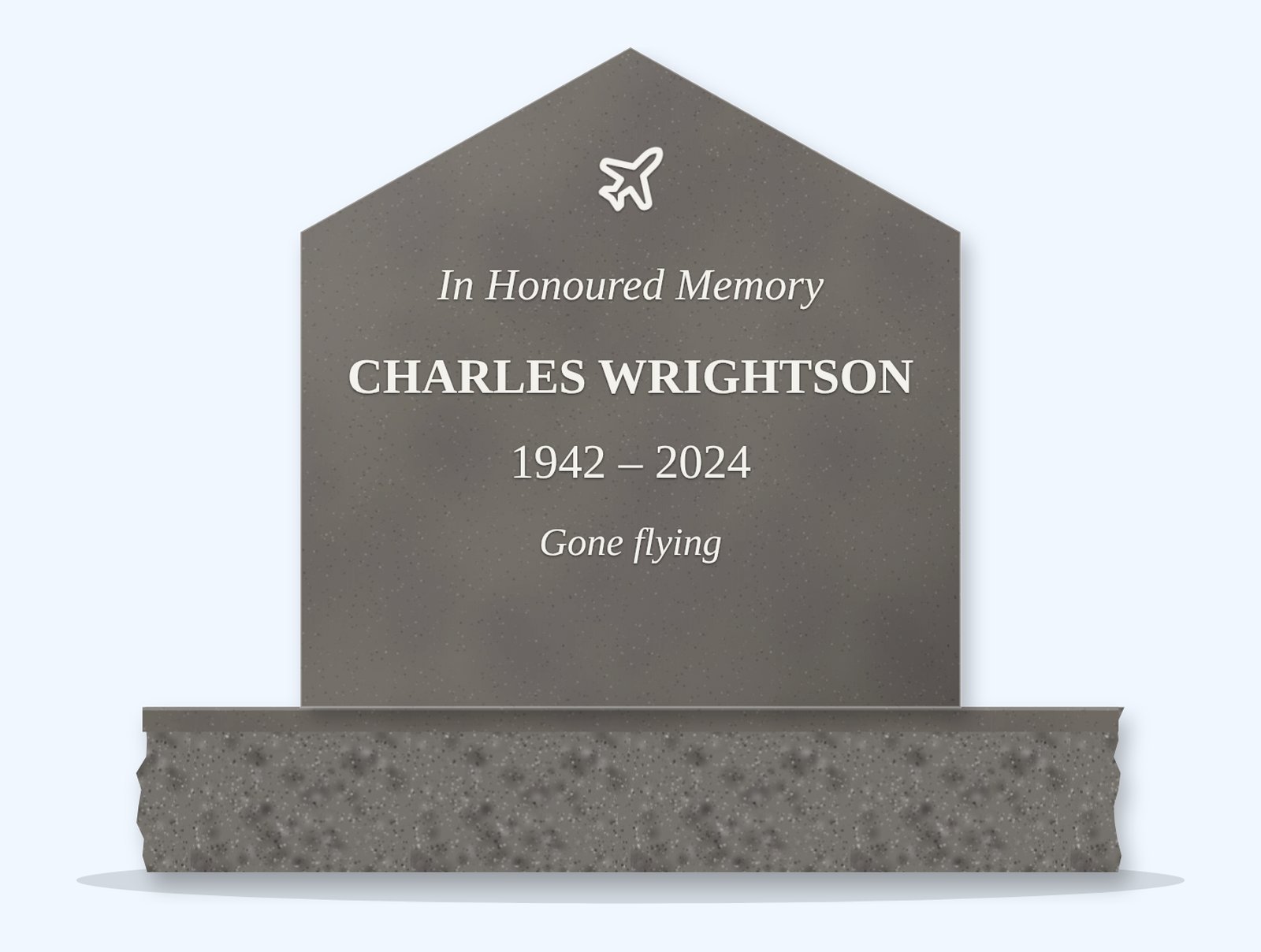 Grey gable headstone on a granite base, engraved for Charles Wrightson