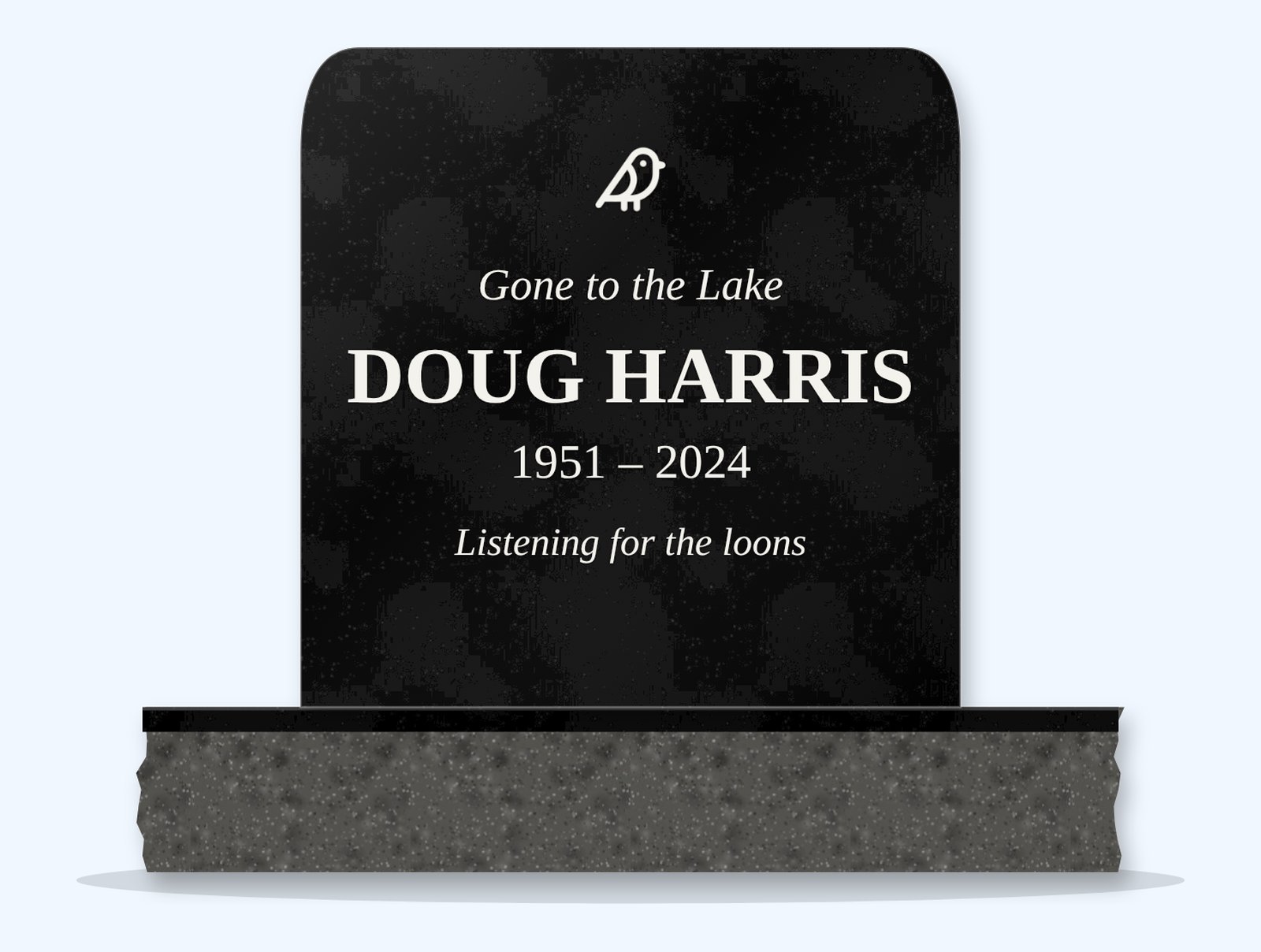Absolute Black rounded headstone on a granite base, engraved for Doug Harris