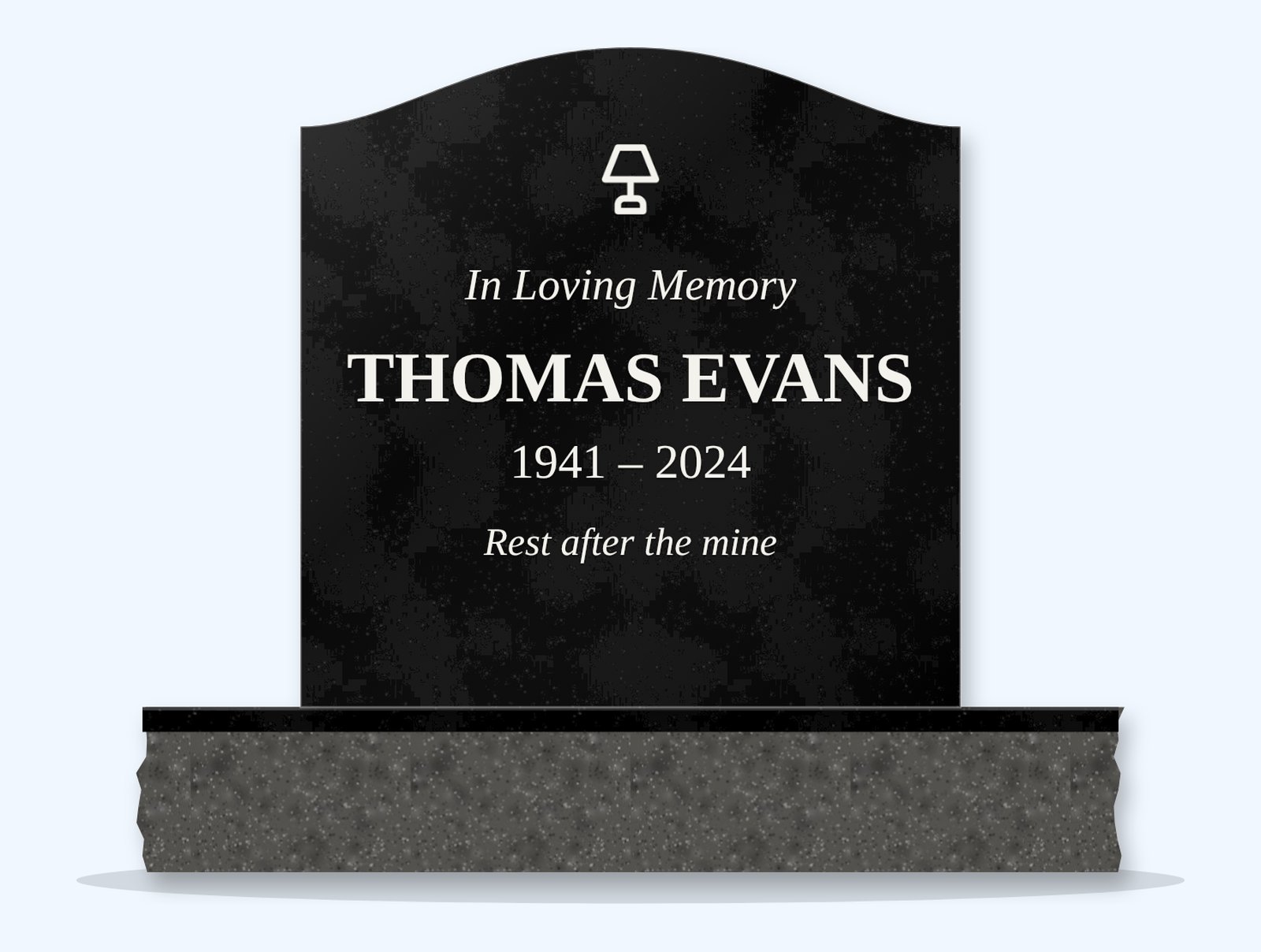 Absolute Black serpentine headstone on a granite base, engraved for Thomas Evans