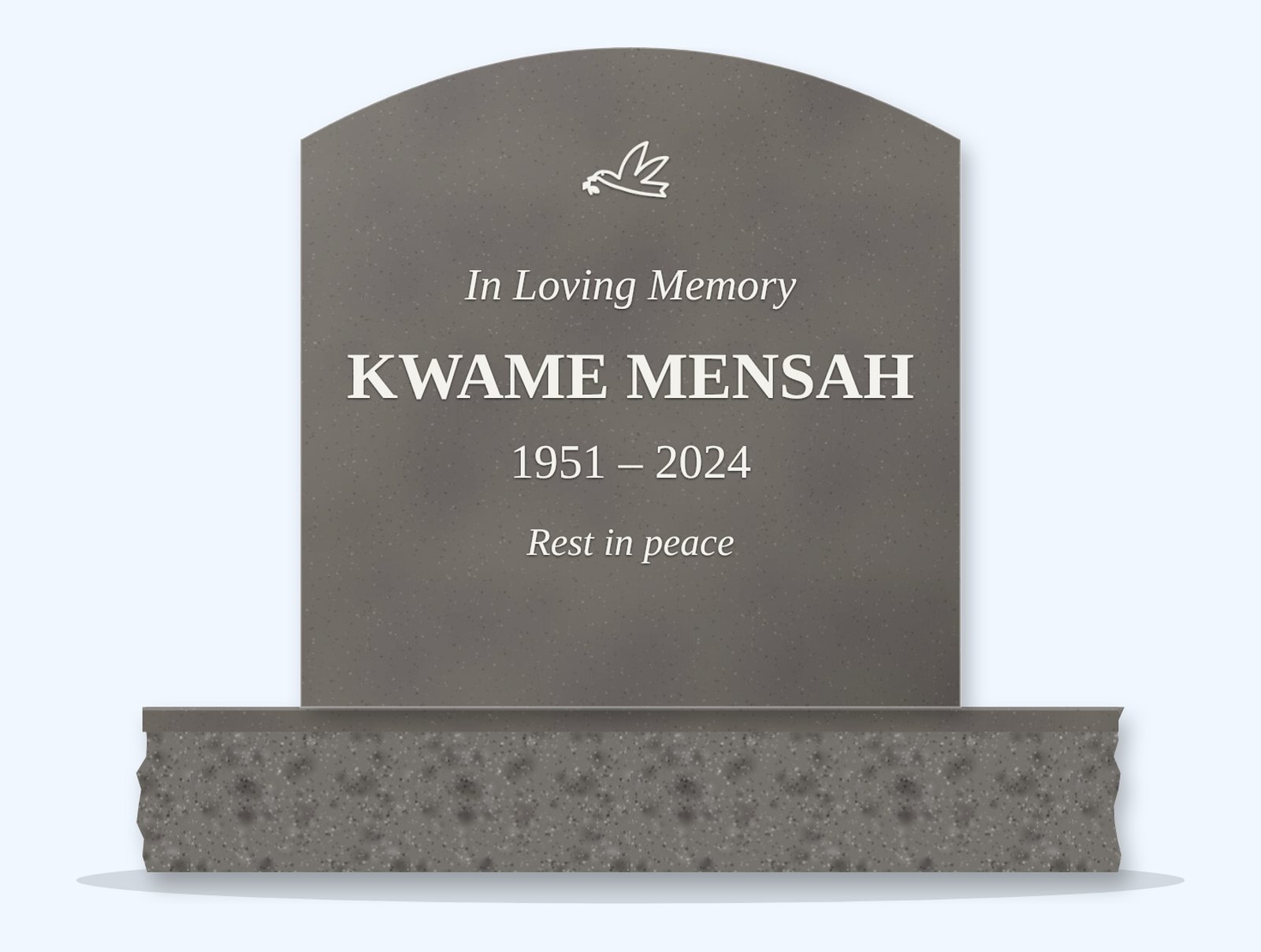 Grey curved-top headstone on a granite base, engraved for Kwame Mensah