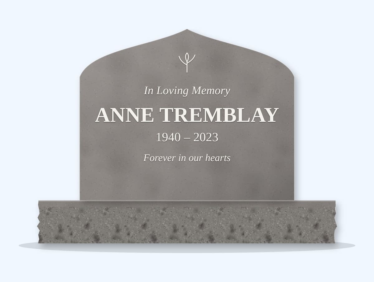 Indian Grey curved peak headstone on a granite base, engraved for Anne Tremblay