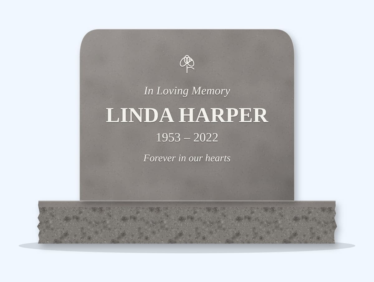Indian Grey rounded top headstone on a granite base, engraved for Linda Harper