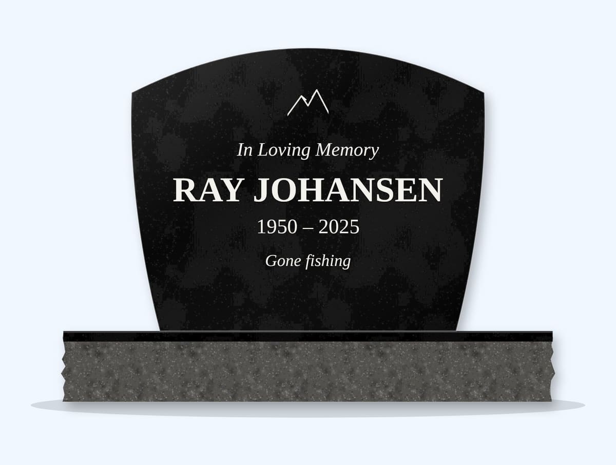 Absolute Black swoop headstone on a granite base, engraved for Ray Johansen