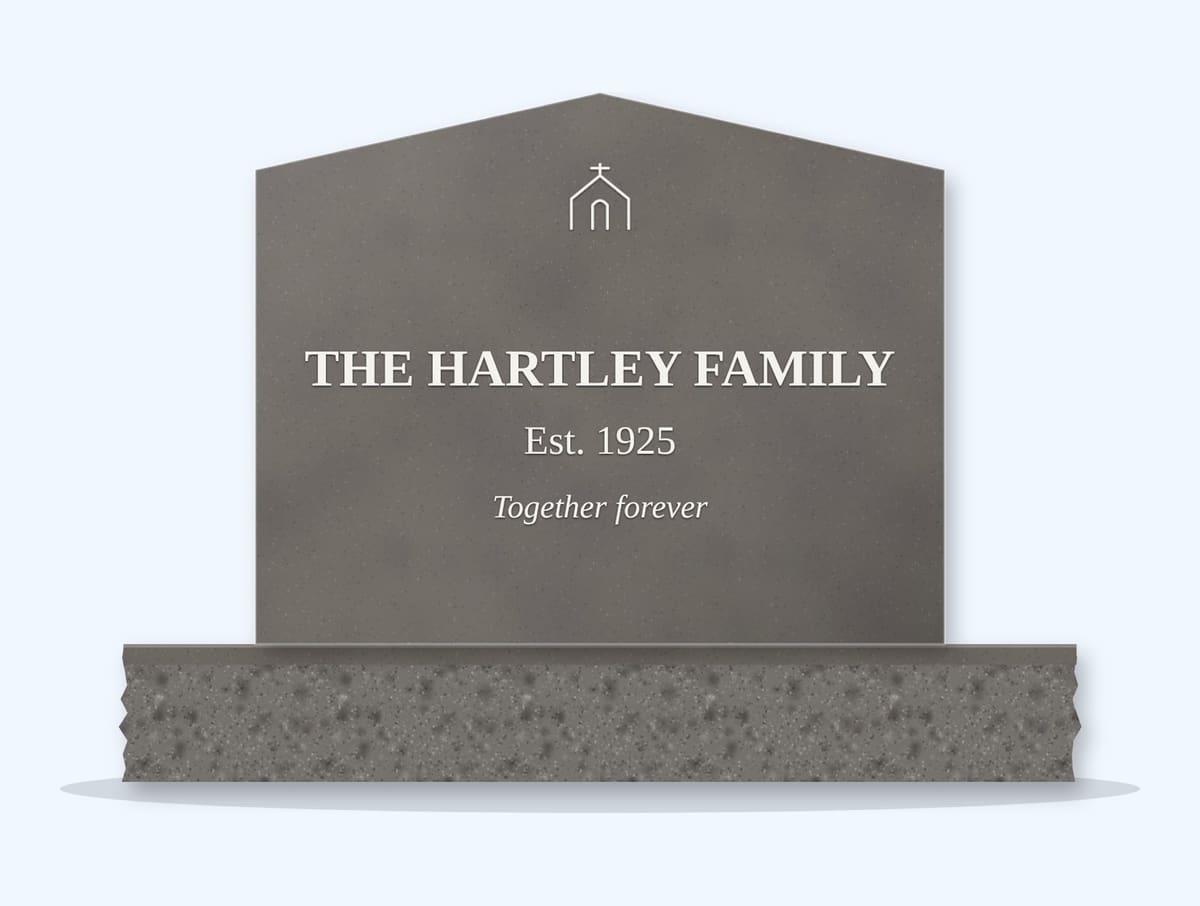 Steel Grey peak headstone on a granite base, engraved for the Hartley Family