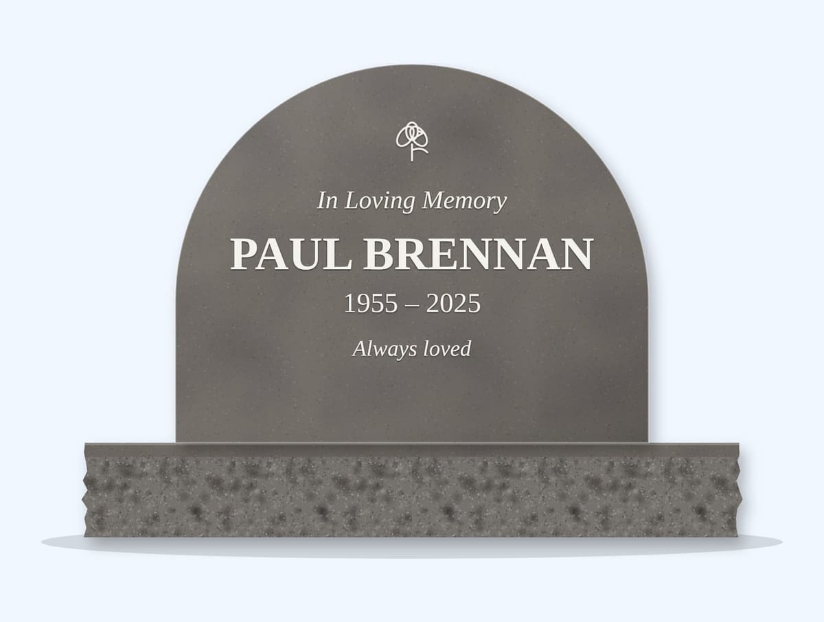 Steel Grey half round headstone on a granite base, engraved for Paul Brennan