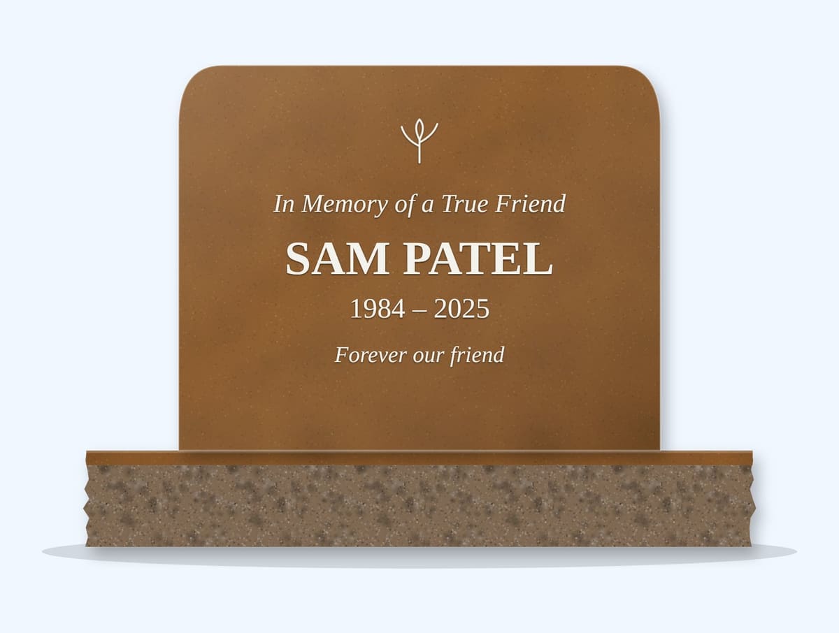 Tan Brown rounded top headstone on a granite base, engraved for Sam Patel